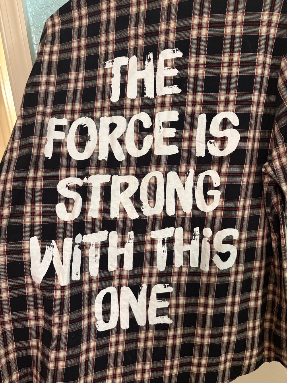 Cakeworthy Plaid Flannel Shirt with 'The Force Is Strong With This One' Graphic